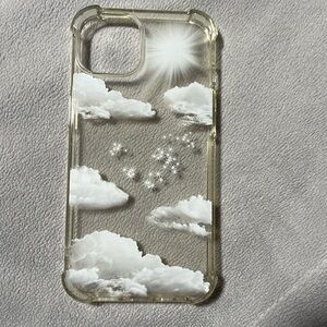 Used iPhone 13 case. Clear with sun & clouds design.